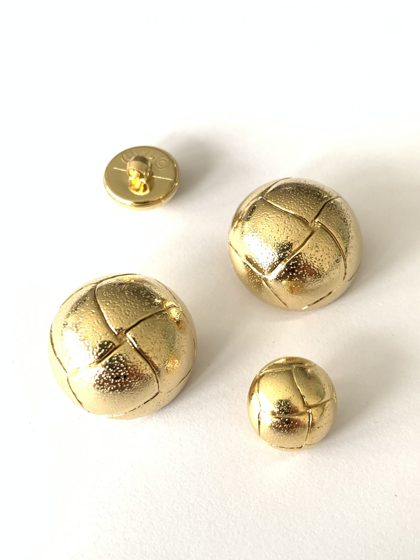 Shiny gold buttons