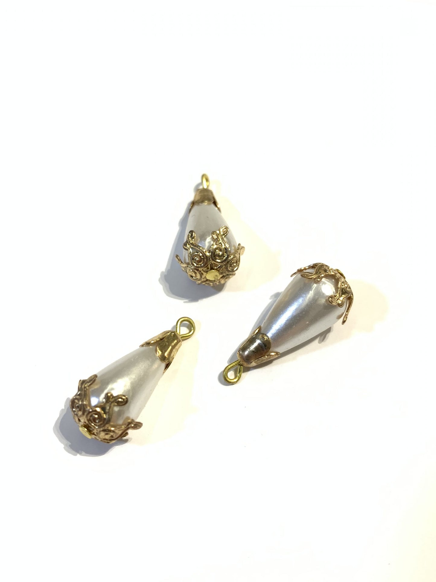 Teardrop pearls with gold insertion