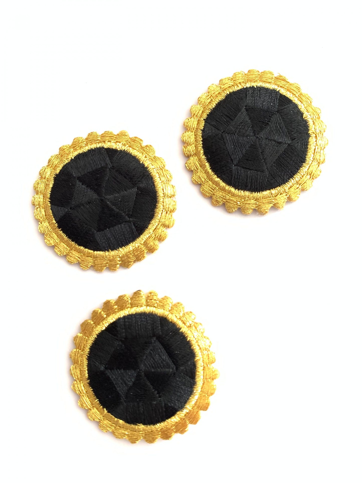 Self-adhesive embroidered round motif